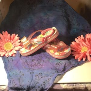 Barely worn slide back unicorn flip flops. Size 2